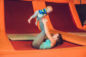 Mother,And,Her,Son,Jumping,On,A,Trampoline,In,Fitness